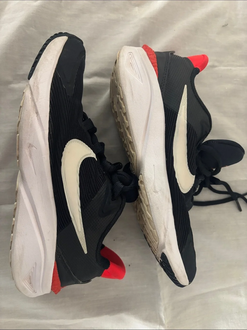 Nike Boys Sneakers in Black with White Swoosh and Red Accent